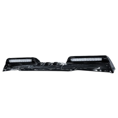 Carbon look LED roof light bar pod for Ford F-150 Raptor featuring integrated lighting and aggressive off-road exterior styling.