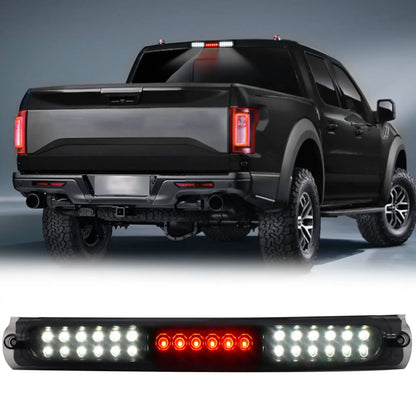 LED third brake light with integrated cargo lights, smoked lens and black housing for Ford F-150, F-250 and Ford Excursion.