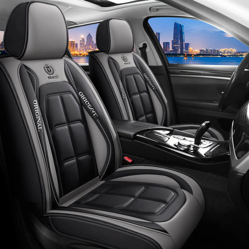 Universal leather car seat cover installed on driver seat providing protection, comfort and premium interior upgrade for any vehicle.